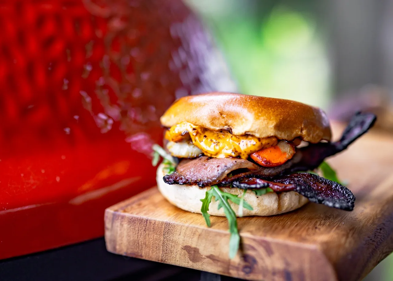 Scallop and bacon bap with chilli crisp mayo ready to serve
